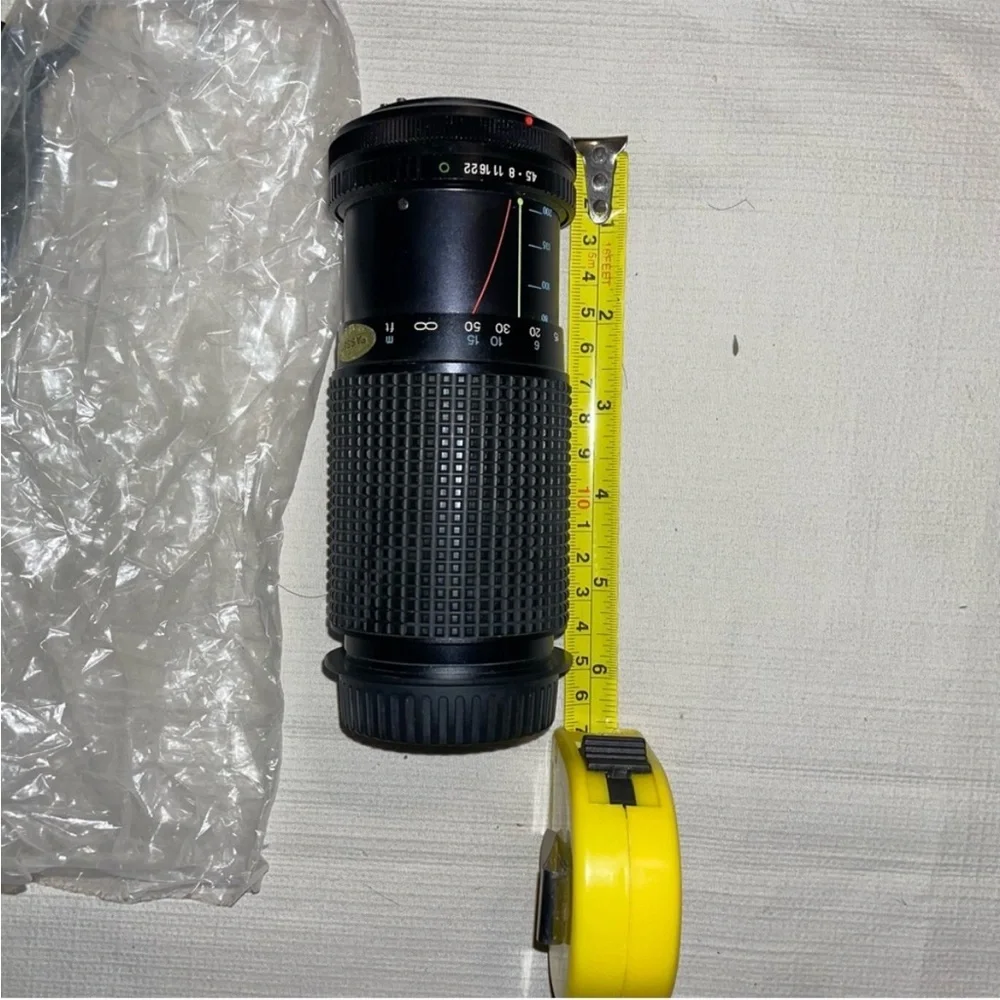 TOKINA Black Zoom Lens with Essential Accessories